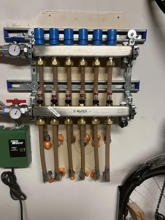 Plumber performing Water Heater Repair at a residential property in Taunton